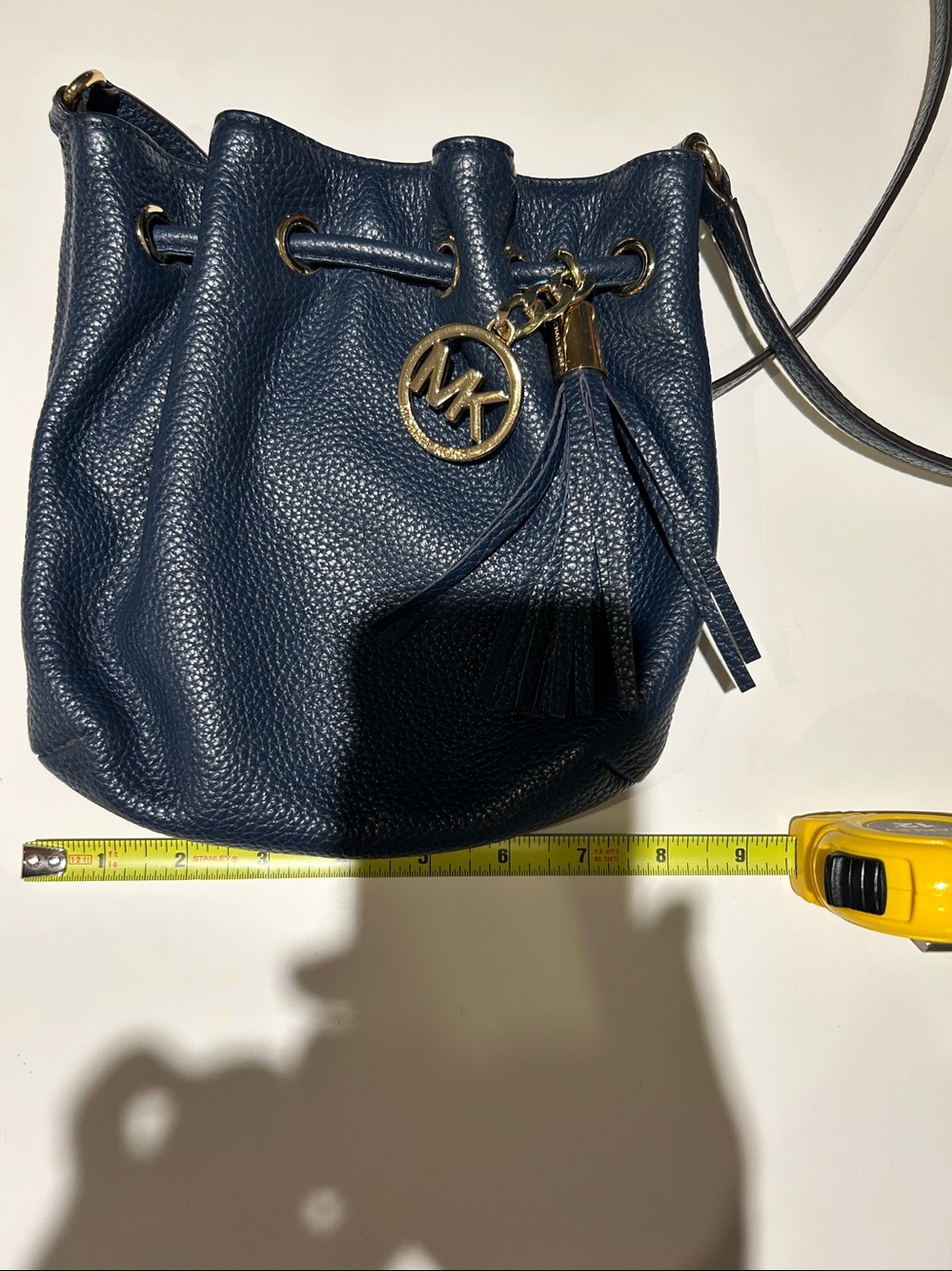 Michael Kors Navy Pebbled Leather Drawstring Crossbody with Gold MK Charm - Picture 9 of 11